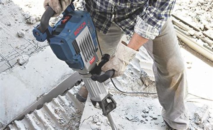Can I break concrete with a hammer drill?