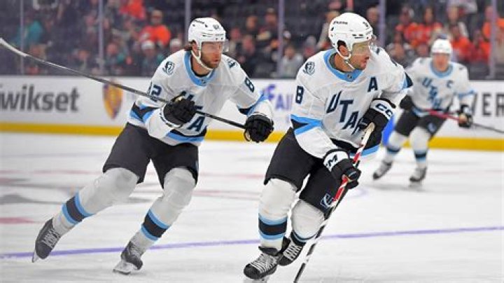 When did the NHL start freezing pucks?